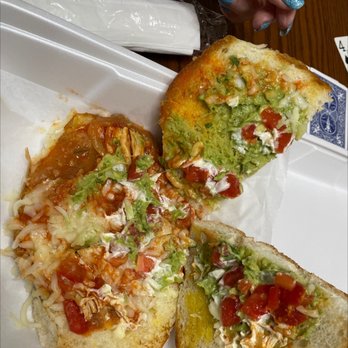 Takito Place - a close up of a plate of food - Mexican Near Me - Louisville, Kentucky Takito Place - a close up of a plate of food - Mexican Near Me - Louisville, Kentucky