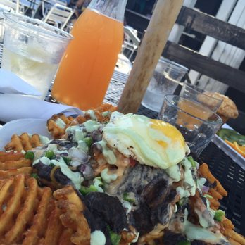 Guyutes - Tequila Sunfryz (substituted pork for bean purée) egg onions queso and some more stuff. 10 dollar mimosa carafe (strawberry banana) - Bars Near Me - Oklahoma City, Oklahoma Guyutes - Tequila Sunfryz (substituted pork for bean purée) egg onions queso and some more stuff. 10 dollar mimosa carafe (strawberry banana) - Bars Near Me - Oklahoma City, Oklahoma