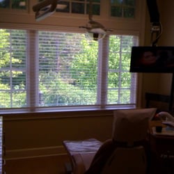 Family Dentistry on Freedom - Patient operatory with large window and T.V. mounted from the ceiling