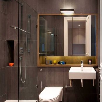 Soto Construction - a bathroom with a toilet, sink, and shower - General Contractors Near Me