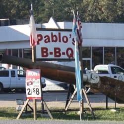Pablo's BBQ and Mexican Food - Pablo's smoking shotgun and Highway 69 frontage sign.