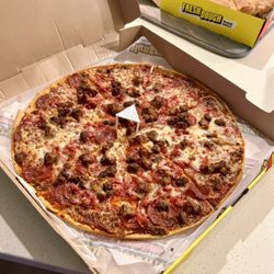 Hungry Howie's Pizza & Subs - Meat eater's thin crust pizza.