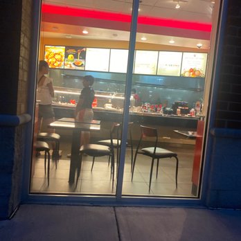 Panda Express - two people standing in front of a restaurant - Chinese Near Me - Lake Zurich, Illinois