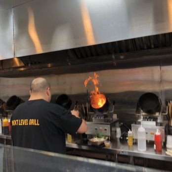 Whealthy - Flare up from the rotating hot pot. - Asian Fusion Near Me - Sandy Springs, Georgia