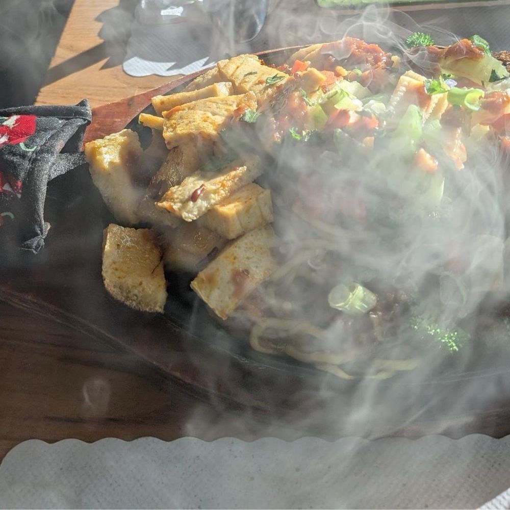 Manchurian sizzler with tofu added on request. Manchurian sizzler with tofu added on request.