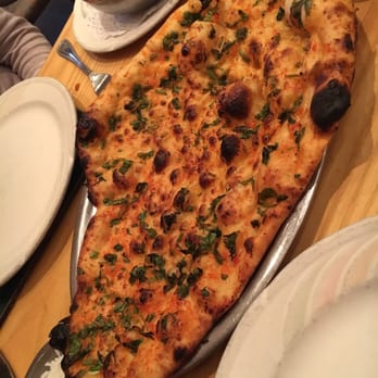 Indian Orchard - Garlic and coriander naan bread. - Indian Near Me - Glasgow, GLG Indian Orchard - Garlic and coriander naan bread. - Indian Near Me - Glasgow, GLG
