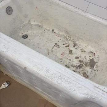 Tub Guy - Before photo of the tub and beginning to grind down old residue and imperfections. - Refinishing Services Near Me Tub Guy - Before photo of the tub and beginning to grind down old residue and imperfections. - Refinishing Services Near Me