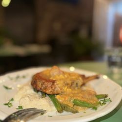 Café Amelie - Pork chops and grits