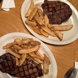 12 oz New York Strip* with Steak Fries and 11oz Hand-Cut Sirloin* with Steak Fries 12 oz New York Strip* with Steak Fries and 11oz Hand-Cut Sirloin* with Steak Fries
