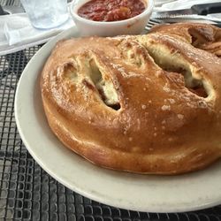 The calzone was huge! I could only eat 1/3 of it. The homemade marinara was really good!