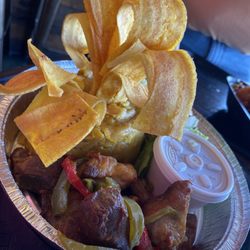 Adobo Latin Kitchen - Fried pork mofongo with plantain chips at the top