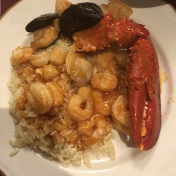 Ole Restaurant - Seafood casserole on the plate. - Portuguese Near Me - Farmingville, New York Ole Restaurant - Seafood casserole on the plate. - Portuguese Near Me - Farmingville, New York