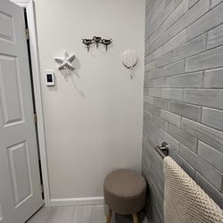 South Shore Kitchen Design - Dressing area with grab bars that look like and double as towel bars.