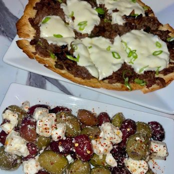 The Cork Room - Cheesesteak flatbread Marinated Olives and Feta - Wine Bars Near Me - Tampa, Florida The Cork Room - Cheesesteak flatbread Marinated Olives and Feta - Wine Bars Near Me - Tampa, Florida