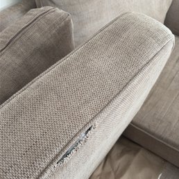 Couch cushion with a tear