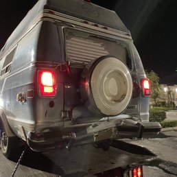 Tow truck dropping us off at 2am in the parking lot of ACC. Tow truck dropping us off at 2am in the parking lot of ACC.