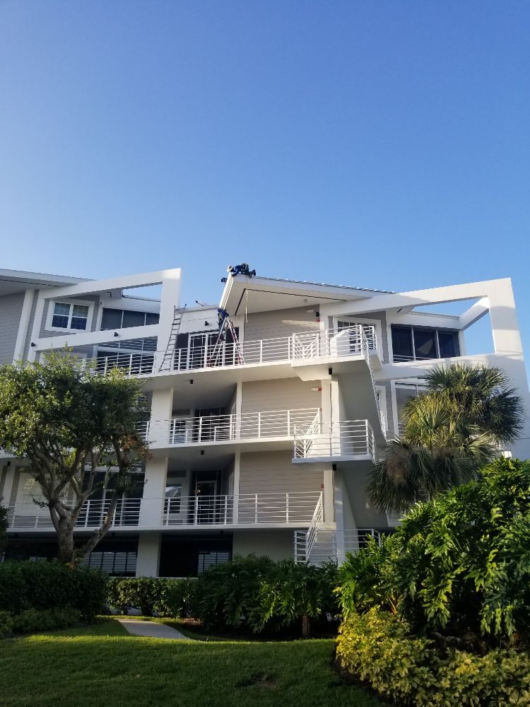 Slide of Flash Roofing & Construction