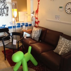Couch Potato Company - Eva leather sofa by Danish company Stouby, plus Ggreen puppy, Wassily chair in haired hide, kids' wallstickers & cushions by