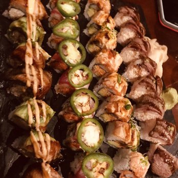Pisces Sushi - Eel the Love Roll on the far left, Filet M Roll on the far right - Sushi Bars Near Me - Charlotte, North Carolina Pisces Sushi - Eel the Love Roll on the far left, Filet M Roll on the far right - Sushi Bars Near Me - Charlotte, North Carolina