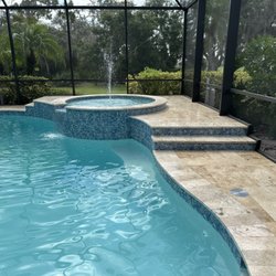 Ultimate Pool Remodel - New pool remodel in Myakka with travertine pool deck, PebbleTec pool finish, new tile