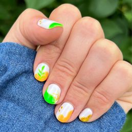 Tropical design for Hawaiian vacation - green, orange, and gold colors with leaf and coral patterns.