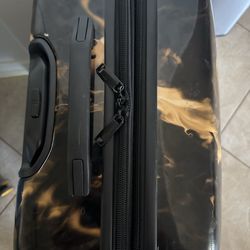 West Coast Luggage Repair - Replaced the zipper puller on one side plus the expander.