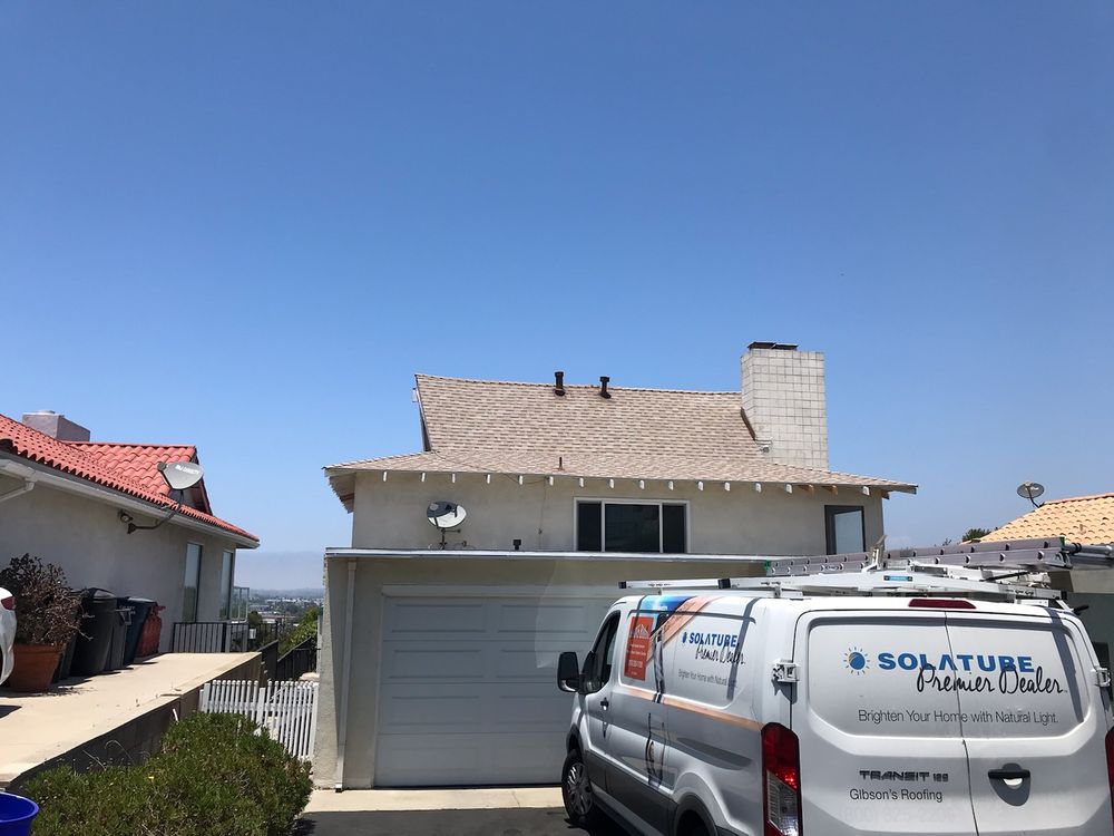 Slide of Gibson's Roofing