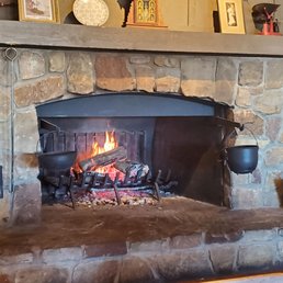 Cracker Barrel fireplace adds some atmosphere and warmth on a chilly Michigan day. Cracker Barrel fireplace adds some atmosphere and warmth on a chilly Michigan day.