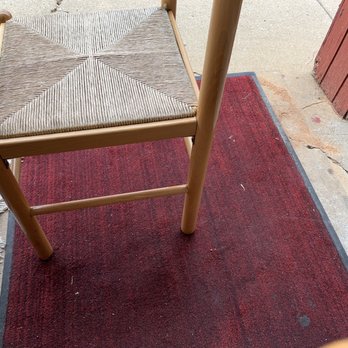 Metro Dhaba - a wooden chair on a red rug - Italian Near Me - Gaithersburg, Maryland Metro Dhaba - a wooden chair on a red rug - Italian Near Me - Gaithersburg, Maryland