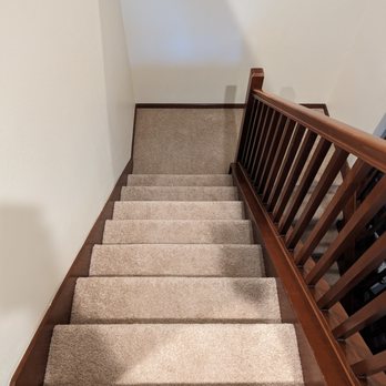 Empire Today - a staircase leading to a second floor - Carpet Installation Near Me