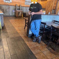Dickey's Barbecue Pit - Waiter worker waiting on some food that probably got ordered 30 minutes before he got there.
