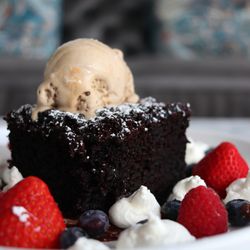 Oli's Fashion Cuisine - Black Out Cake topped with dolce gelato