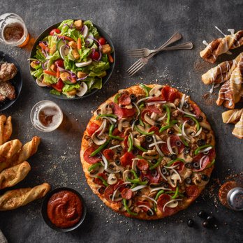Round Table Pizza - a variety of food items - Pizza Near Me - Palo Alto, California Round Table Pizza - a variety of food items - Pizza Near Me - Palo Alto, California