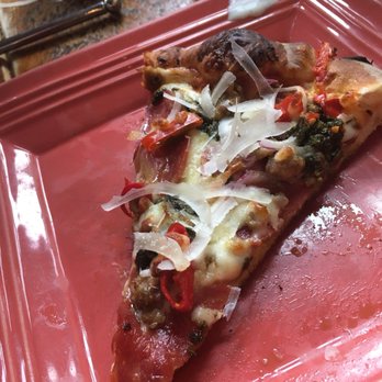 Wild Tomato - Last slice of Pisano with fresh mozzarella - Pizza Near Me - Fish Creek, Wisconsin Wild Tomato - Last slice of Pisano with fresh mozzarella - Pizza Near Me - Fish Creek, Wisconsin