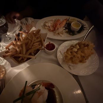 Sea Fire Grill - Surf and turf, Herb fries, lobster Mac and cheese, deshelled snow crab legs - Seafood Near Me - New York, New York Sea Fire Grill - Surf and turf, Herb fries, lobster Mac and cheese, deshelled snow crab legs - Seafood Near Me - New York, New York