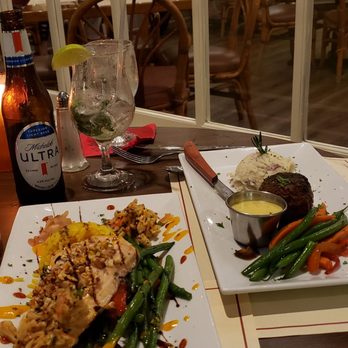 The Raintree Restaurant - Our entrees (peanut crusted salmon & filet mignon) - American Near Me - Saint Augustine, Florida
