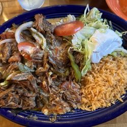 Los Morales Authentic Mexican Restaurant - Believe it or not this is an enchilada rancheros 3 special. The pork melts in your mouth.