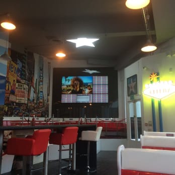 Celebz American Diner - LMFAO's "sexy and I know it" music video screeching at me from a half-broken display. - American Near Me - Birmingham, XWM