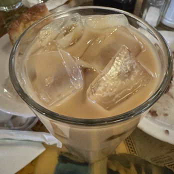 Kopi A Travelers Cafe - Thai Iced Coffee - 16 oz - Coffee & Tea Near Me - Chicago, Illinois Kopi A Travelers Cafe - Thai Iced Coffee - 16 oz - Coffee & Tea Near Me - Chicago, Illinois