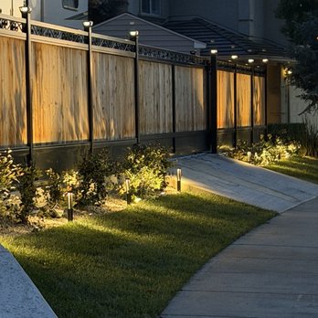 LH Custom Fencing - Lighting and bushes along the fence they made. - Fences & Gates Near Me
