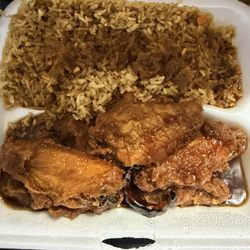 Suki Japanese Asian Cuisine - Braised chicken wings with fried rice added braised sauce on the rice