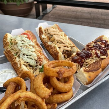 Dog Haus Biergarten - Old Pasadena - front: onion rings and cowboy back: sooo cali and chili the kid + miso ranch - New American Near Me - Pasadena, California Dog Haus Biergarten - Old Pasadena - front: onion rings and cowboy back: sooo cali and chili the kid + miso ranch - New American Near Me - Pasadena, California