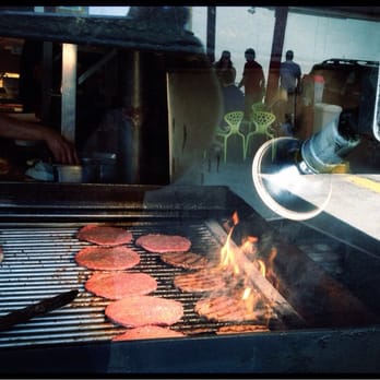 Top Notch - Burgers on the grill, while the Austin Yelp Burger of the Month Club awaits in the reflection. - Fast Food Near Me - Austin, Texas Top Notch - Burgers on the grill, while the Austin Yelp Burger of the Month Club awaits in the reflection. - Fast Food Near Me - Austin, Texas