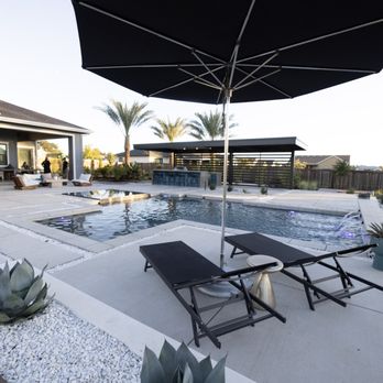 Poseidon Custom Pools - Modern pool, infinity spa, patio cover, sunken fire pit and outdoor kitchen - Pool & Hot Tub Service Near Me Poseidon Custom Pools - Modern pool, infinity spa, patio cover, sunken fire pit and outdoor kitchen - Pool & Hot Tub Service Near Me