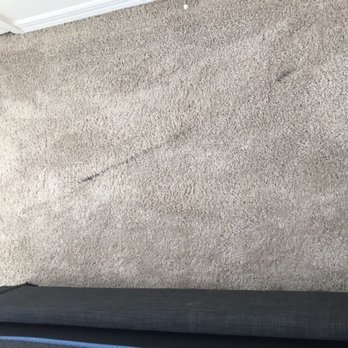 Stanley Steemer - Another angle of the grease stain. - Carpet Cleaning Near Me - Lakeland, Florida