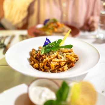 Hukilau Lanai - Chicken Cacciatore Pasta $28 "local kcac braised chicken, hamakua mushrooms, peppers & onions in a red wine tomato sauce" - Seafood Near Me - Kapaa, Hawaii