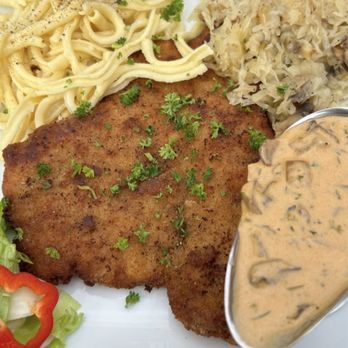 German Guys - Schnitzel with side of Hunter sauce, spatzle & sauerkraut with mushrooms. - German Near Me - Stockton, California German Guys - Schnitzel with side of Hunter sauce, spatzle & sauerkraut with mushrooms. - German Near Me - Stockton, California