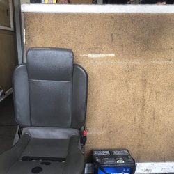 Real Muffler Stop - The waiting area. The seats are car seats, lol