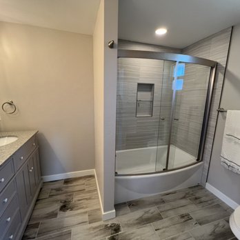 Alpine Kitchen And Bath Remodeling - a shower and sink - General Contractors Near Me
