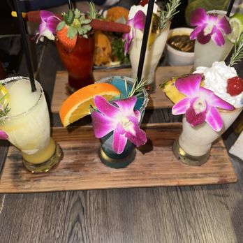 Dona Leti's - Drink sampler: passion fruit margaritas, blue, piña colada - Cocktail Bars Near Me - Houston, Texas